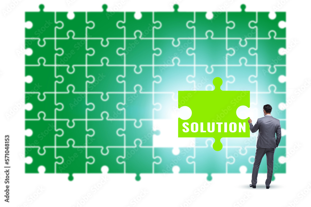 Business solution concept with jigsaw puzzle pieces Business solution concept with jigsaw puzzle pieces
