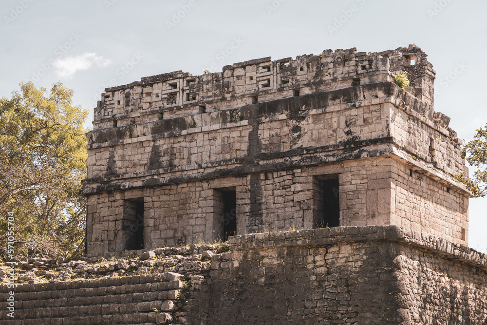 The ruins of a beautiful pyramid in the archaeological zone of Chichen Itza in Mexico.