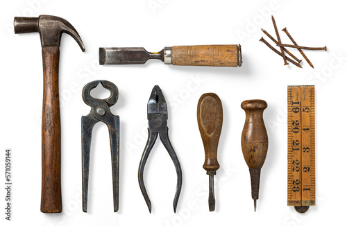 collection of vintage tools, hammer, chisel, screwdriver, grippers, awl, wooden ruler and rusty nails, isolated over a transparent background, craft / craftsmanship / father's day design elements photo