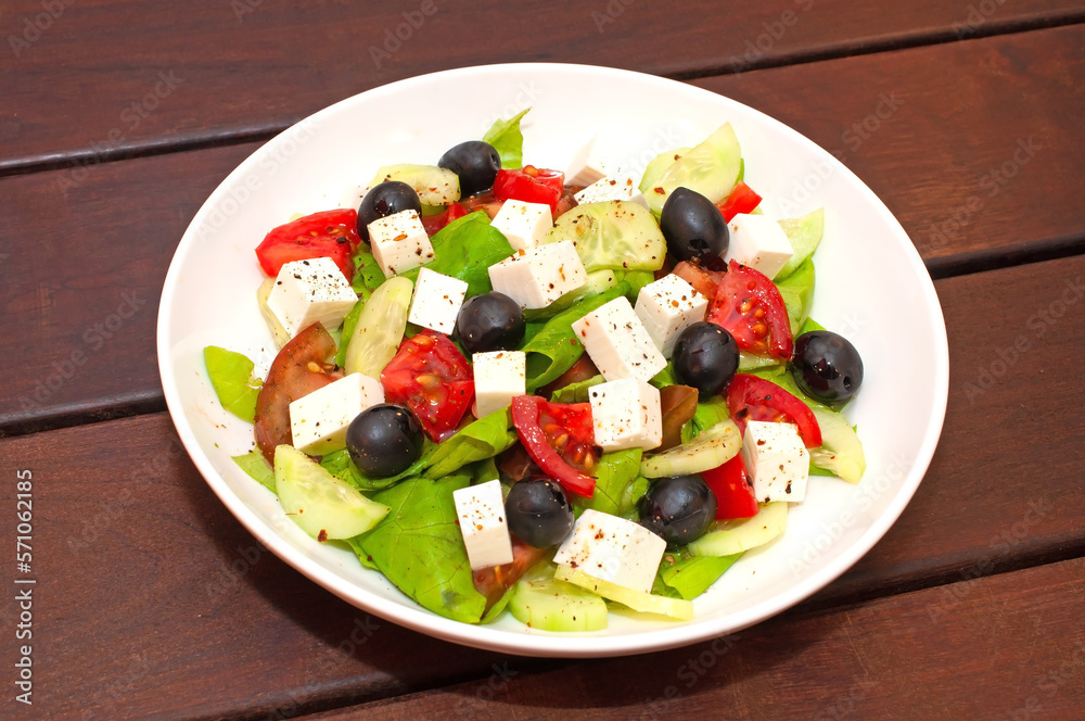 Greek salad with fresh vegetables closeup