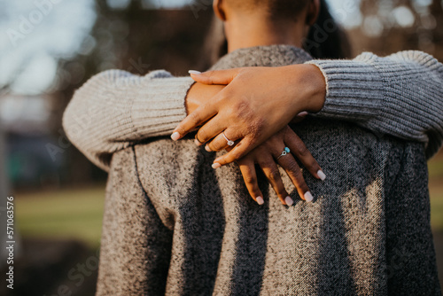 black love couple kissing hands ring