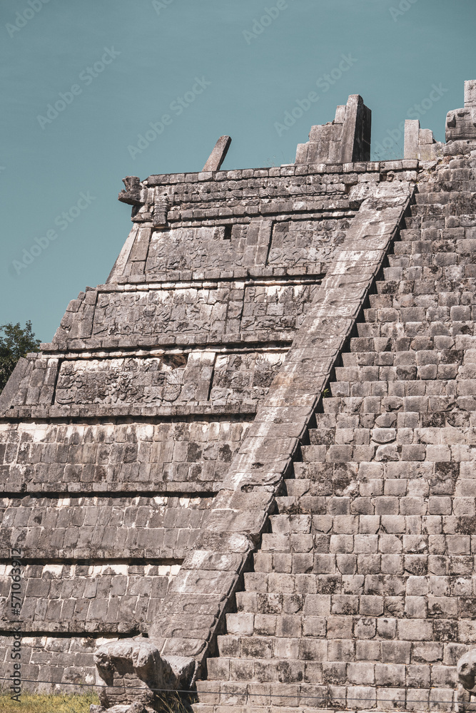 The ruins of a beautiful pyramid in the archaeological zone of Chichen Itza in Mexico. The ruins of a beautiful pyramid in the archaeological zone of Chichen Itza in Mexico.