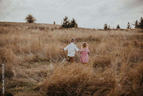kids running through field