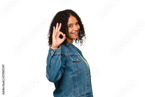 Young african american curly woman isolated cheerful and confident showing ok gesture. photo