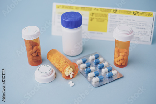 The prescription medication and healthcare concept on blue background.