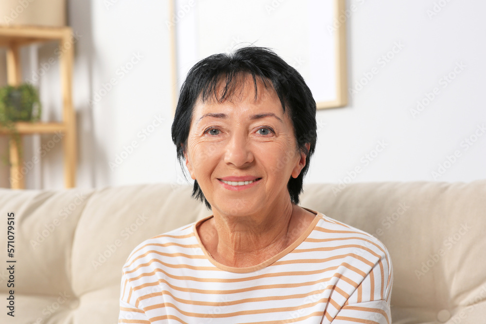 Portrait of smiling senior woman at home Portrait of smiling senior woman at home