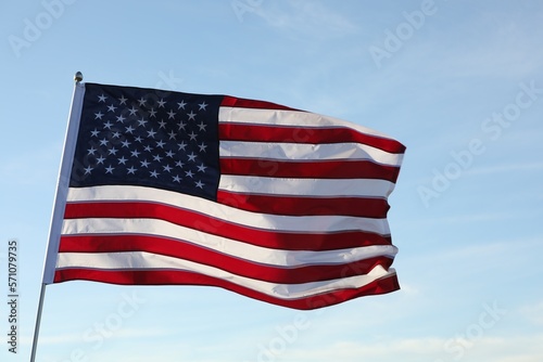 American flag fluttering outdoors on sunny day