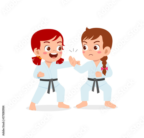 cute little kid training karate with friend together