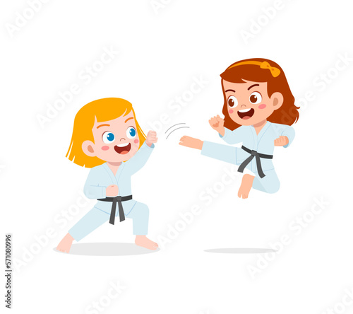 cute little kid training karate with friend together