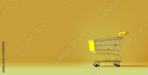 Yellow supermarket trolley or basket on yellow background. Shopping, sale, discount Space for text