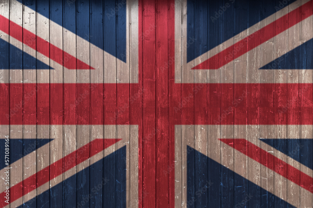Fototapeta premium graffiti of national flag of the uk painted on the rusty wall