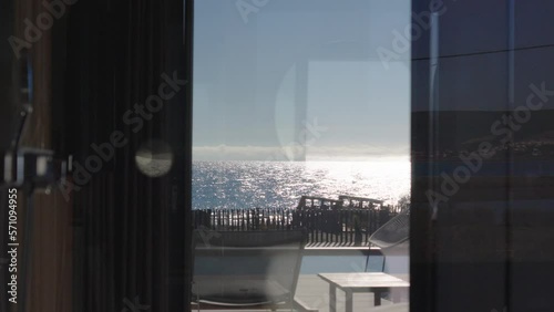 Villa in Frontignan France, with a shot through the window with the mediterranean view. photo