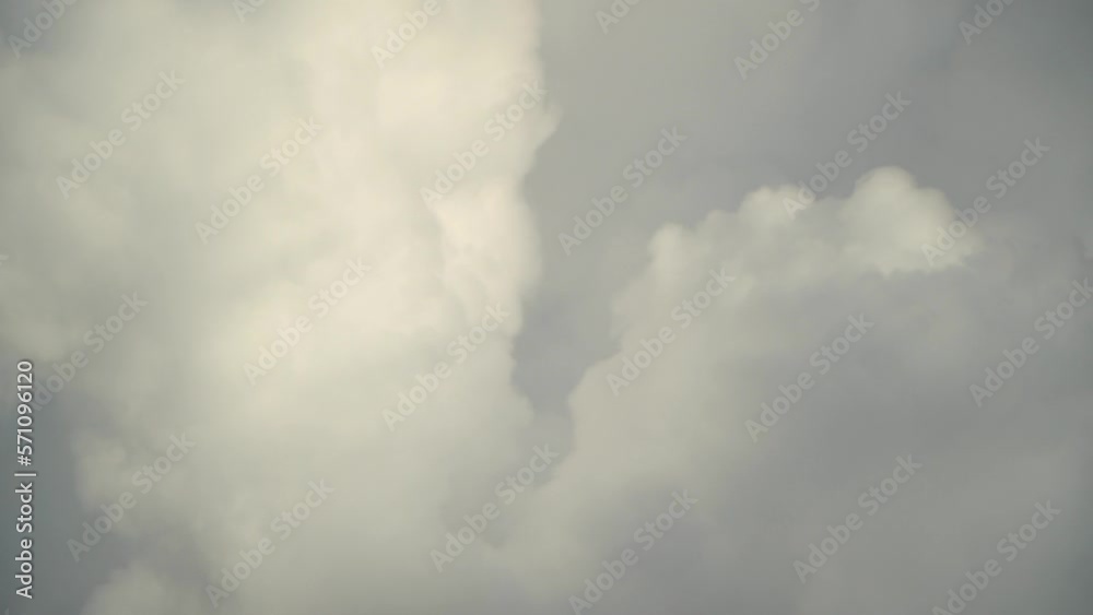 Rising large clouds of steam swirling against the sky in slow motion Rising large clouds of steam swirling against the sky in slow motion