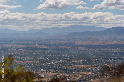 Beautiful view of the large Mexican city of Oaxaca from Monte Alban. View of the endless mountain peaks.