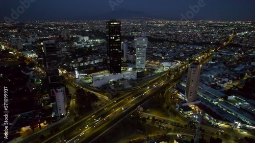Wallpaper Mural Drone footage of an urban landscape view in Puebla city, this video shows the movement arround Zavaleta zone in Puebla, with the malinche mountain in the background Torontodigital.ca