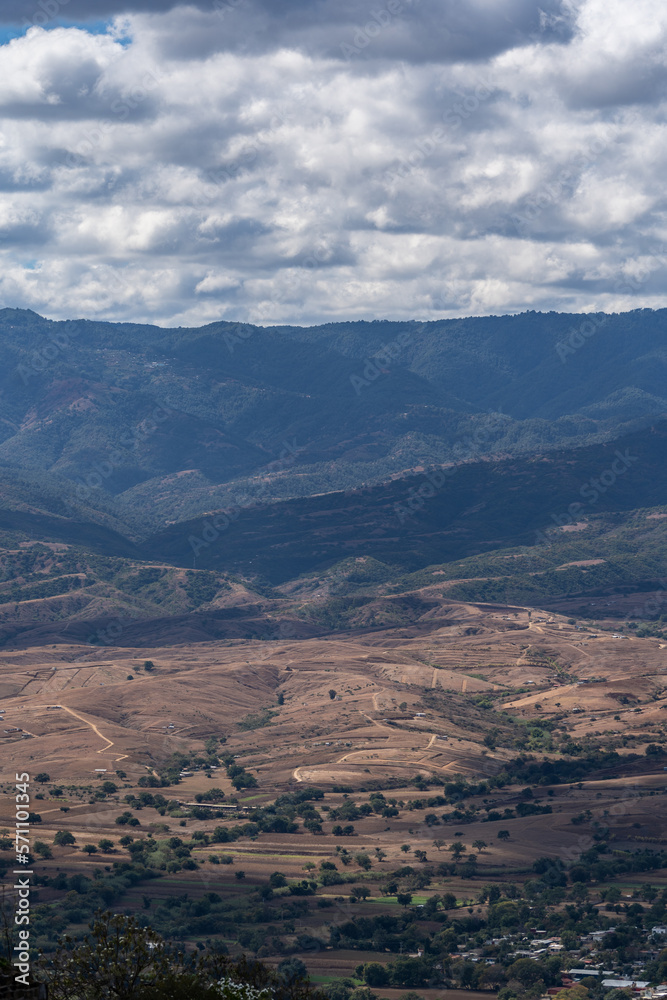Fototapeta premium Beautiful view of the large Mexican city of Oaxaca from Monte Alban. View of the endless mountain peaks.