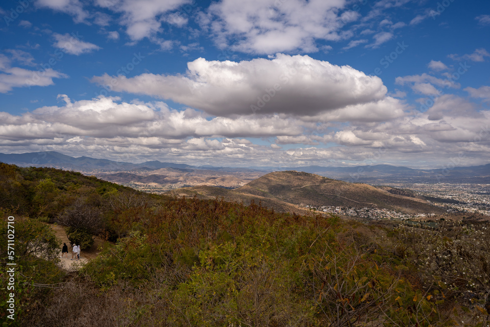 Beautiful view of the large Mexican city of Oaxaca from Monte Alban. View of the endless mountain peaks.