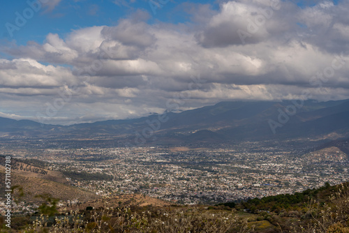 Beautiful view of the large Mexican city of Oaxaca from Monte Alban. View of the endless mountain peaks.