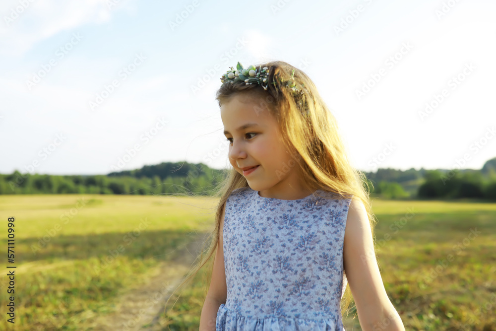 Children walk in the summer in nature. Child on a sunny spring morning in the park. Traveling with children. Children walk in the summer in nature. Child on a sunny spring morning in the park. Traveling with children.