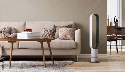 White modern air multiplier working working in cozy living room, beige fabric sofa, cushion, wooden coffee table on sage green wall for air quality smart home lifestyle, technology background 3D