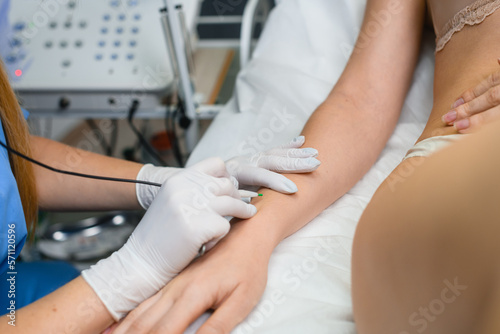 Electrolysis hair removal at hands in salon