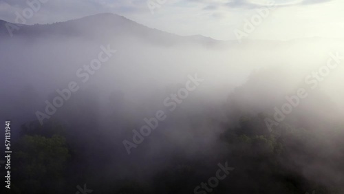 Aerial orbit flight in mist around Smokey Mountain National Park in North Carolina. photo