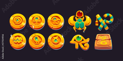 Cartoon set of ancient Egyptian game coins isolated on dark background. Vector illustration of golden money, medals, scarab or ankh amulets decorated with gems, antique symbols. Pharaoh treasure icons