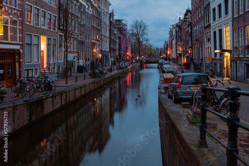 Canals of Amsterdam at night. Amsterdam is the capital and most populous city of the Netherlands