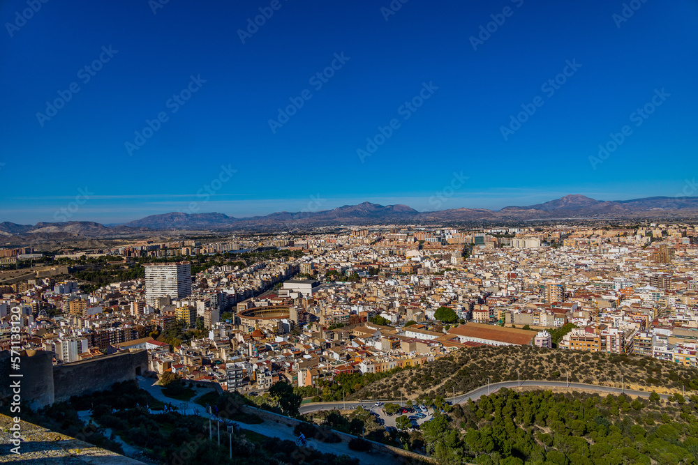 view on a sunny day of the city and colorful buildings from the viewpoint Alicante Spain