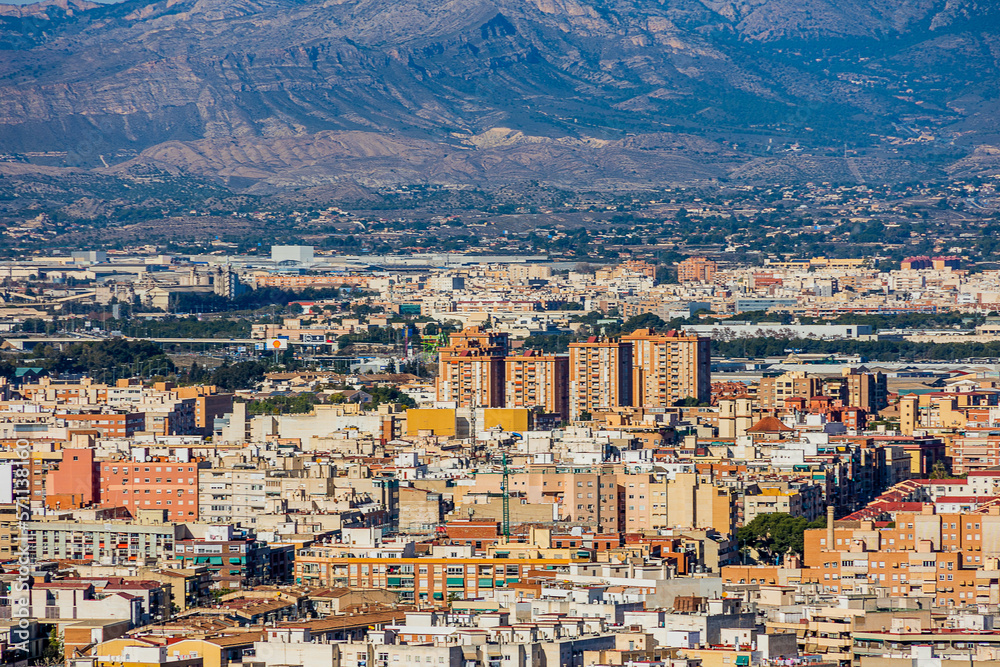 view on a sunny day of the city and colorful buildings from the viewpoint Alicante Spain