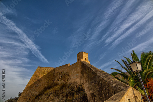  castle of saint barbara in alicante spain against blue sky landmark photo