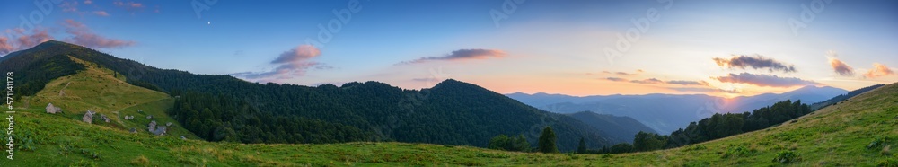 ukrainian highlands in summer. view in to the distant range. sunny sunset in mountains