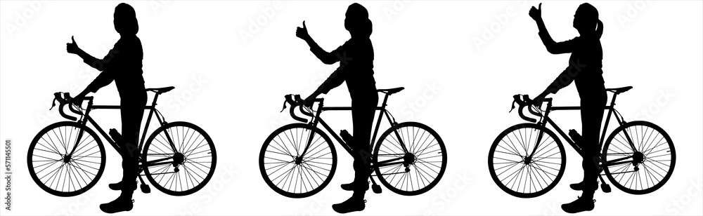 Obraz premium The girl stands near the bicycle, with her hand showing the gesture 