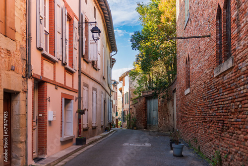 Fototapeta Naklejka Na Ścianę i Meble -  Small narrow street in the town of Rabastens, in Tarn, Occitanie, France
