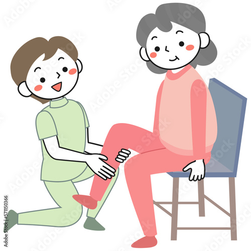 理学療法士とリハビリに取り組むシニア女性