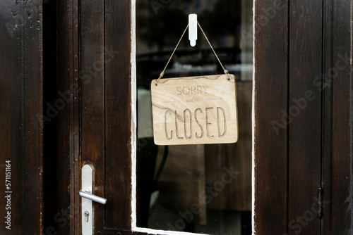 Wooden door with close sign