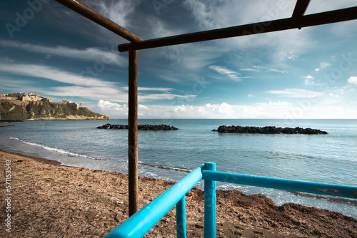 Wooden cottage and teh Chiaiai beach, Procida.