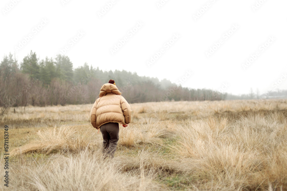 © Cavan Images - Outdoor portrait of a young woman. © Cavan Images - Outdoor portrait of a young woman.