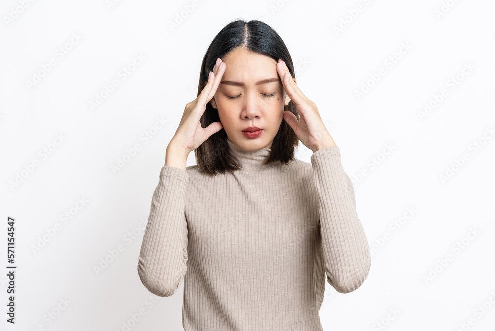 Portrait of beautiful young asian sick woman over isolated white background suffering from headache desperate and stressed because pain and migraine. Cold and fever concept. Portrait of beautiful young asian sick woman over isolated white background suffering from headache desperate and stressed because pain and migraine. Cold and fever concept.