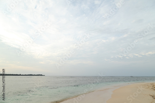 Lombok and Gili Air islands  overcast  cloudy day  sky and sea. Sunset  sand beach.