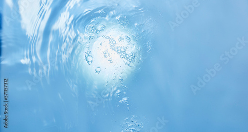 Surface of clean blue water photo