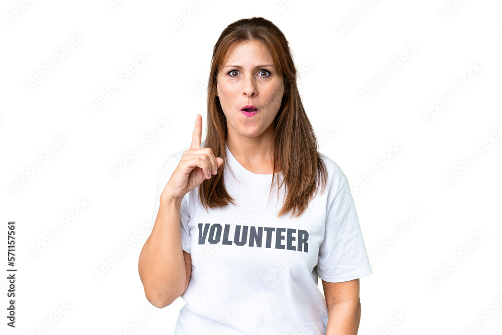 Middle age volunteer woman over isolated background intending to realizes the solution while lifting a finger up Middle age volunteer woman over isolated background intending to realizes the solution while lifting a finger up