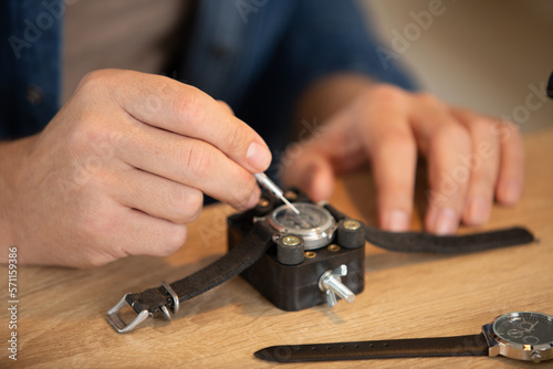 watch maker fixing a watch