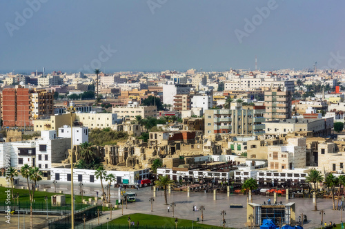 Cityscape under clear sky on sunny day photo