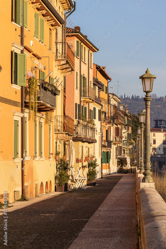 Old facades of houses in sunrise, Verona, Italy, Europe