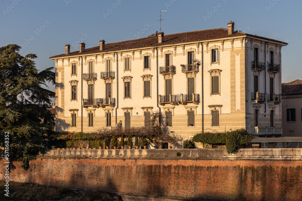 Old facades of houses in sunrise, Verona, Italy, Europe