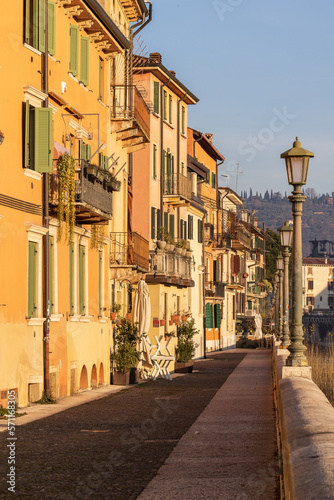 Old facades of houses in sunrise, Verona, Italy, Europe