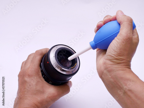 cleaning camera lens with rubber bower