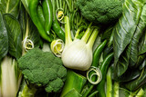 Green colour vegetables, food background. Swiss Chard, broccoli, green beans, fennel, peppers, leek. Healthy eating concept, products packed with vitamins, minerals and fiber.