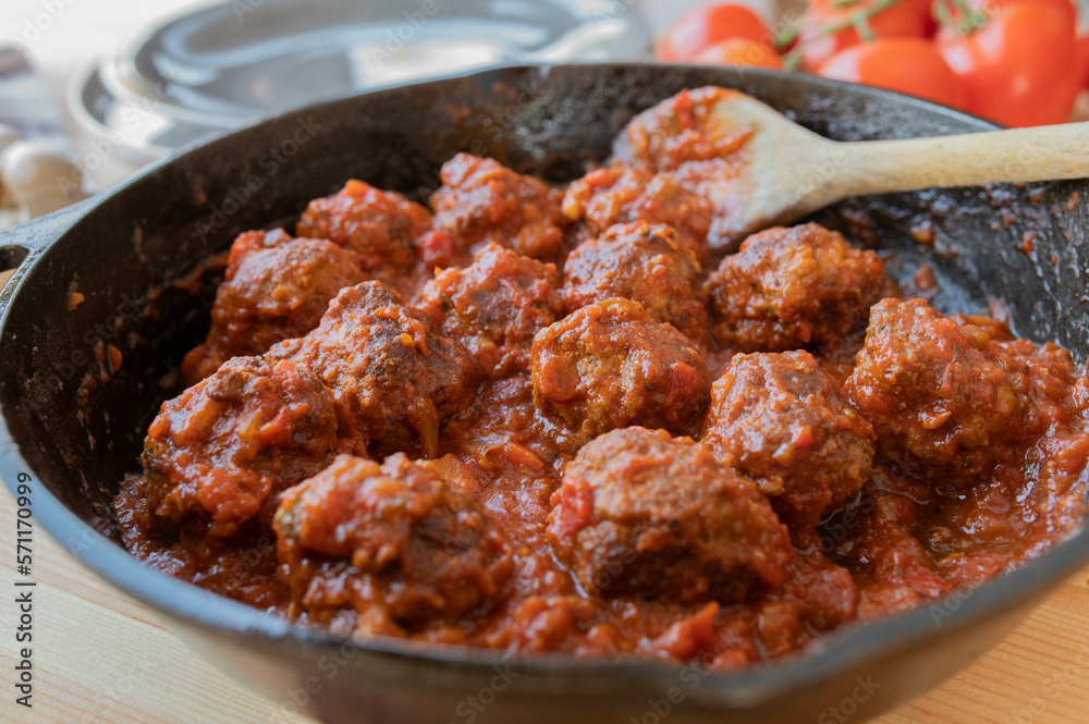 Meatballs with tomato sauce in a cast iron pan Meatballs with tomato sauce in a cast iron pan